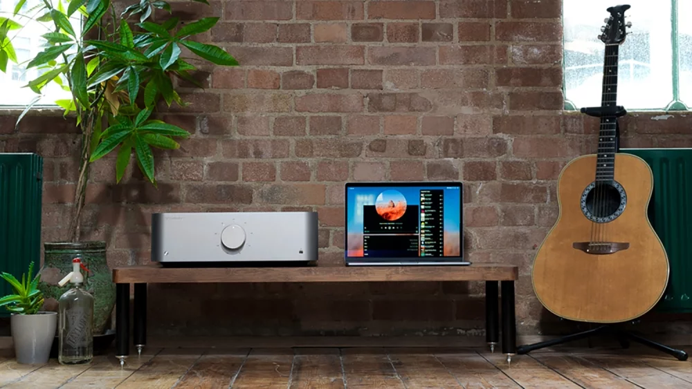 Edge A Integrated Amplifier, laptop and guitar