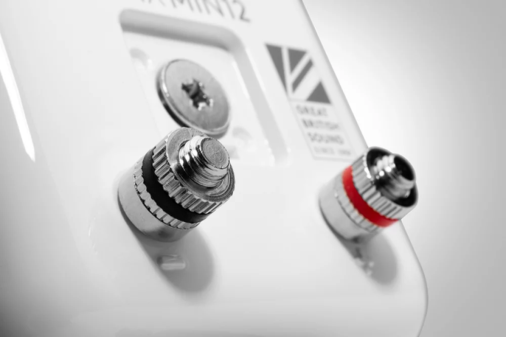 close up image of the back of a white minx min 12 speaker