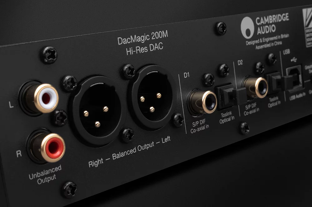 Close up of the rear panel of the DacMagic 200m showing XLR and phono outputs