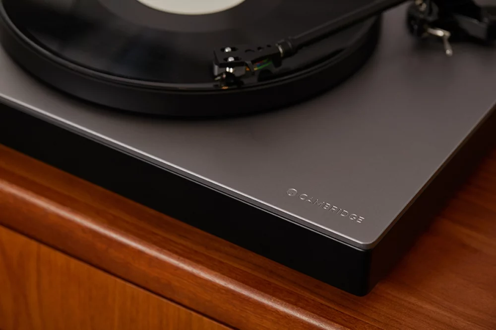 close up of alva tt v2 turntable on wooden unit