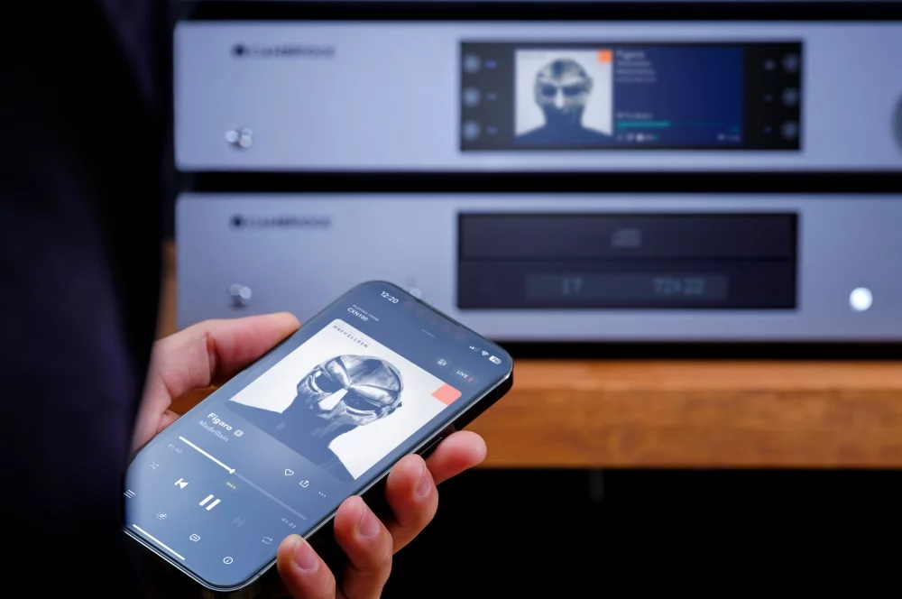 Smartphone playing music through the CXN100 