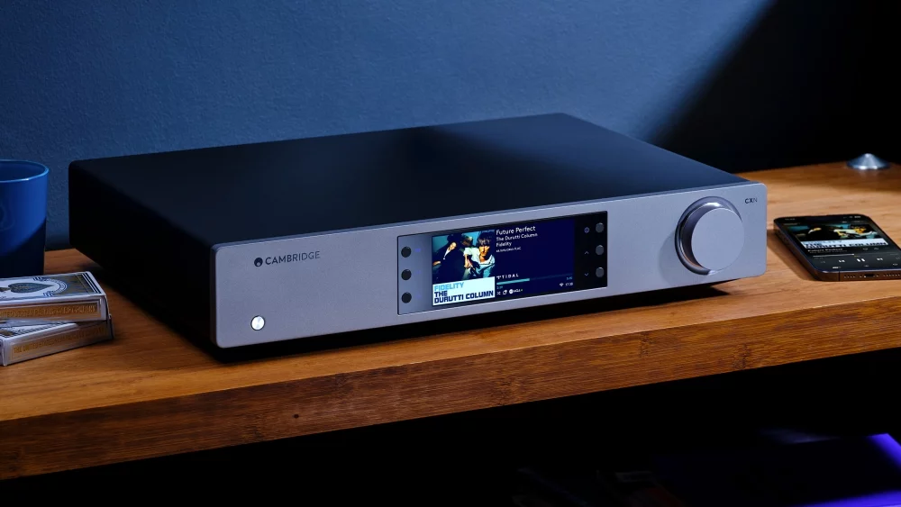 CXN100 Network Player on an hi-fi rack next to a smartphone